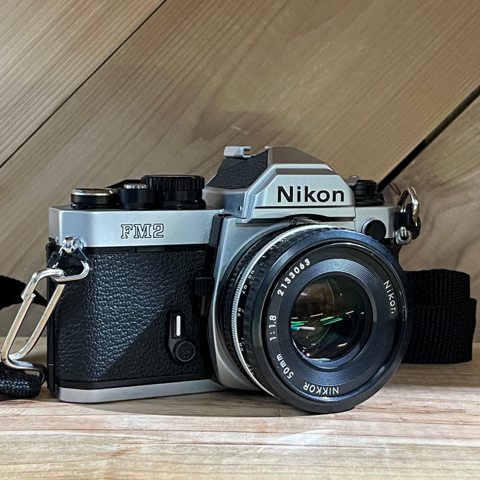 Nikon FM2 35mm SLR Film Camera with 50mm f/1.8 Nikkor Lens (Silver Body) (N 8410464)
