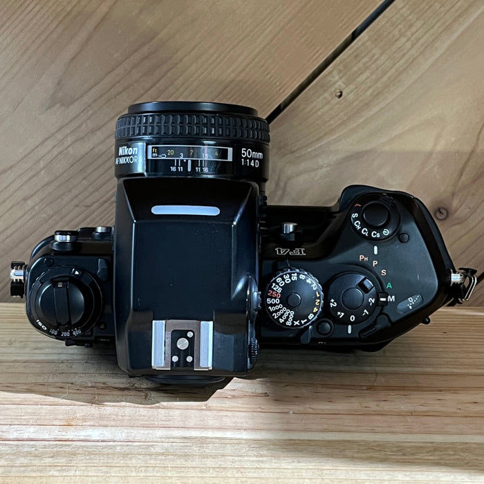 Nikon F4 w/ 50mm AF Nikkor f1.4 Lens & Nikon MB-12 Film Winder (US 2472580)
