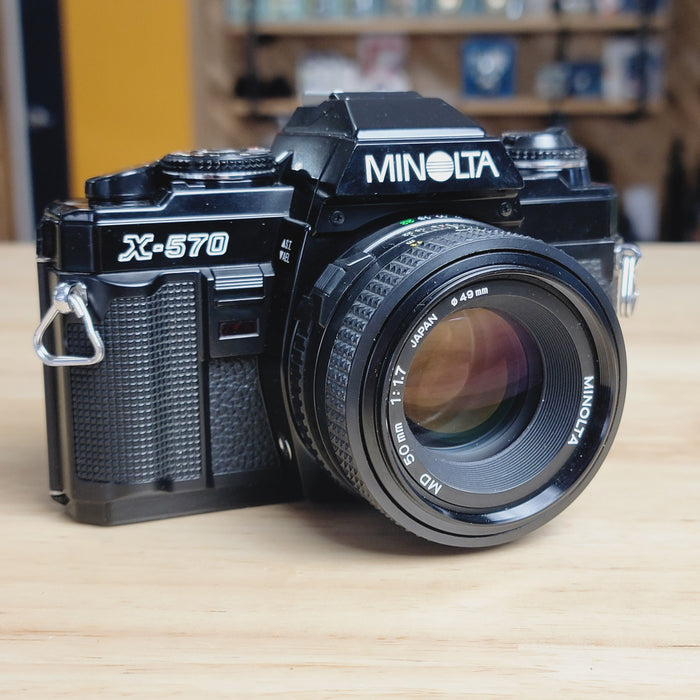 Minolta X-570 SLR with 50mm f/1.7 lens