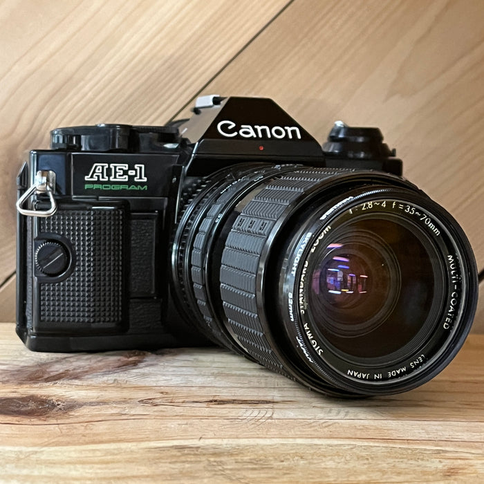 Canon AE-1 Program W/ 35-70 sigma lens (8696)