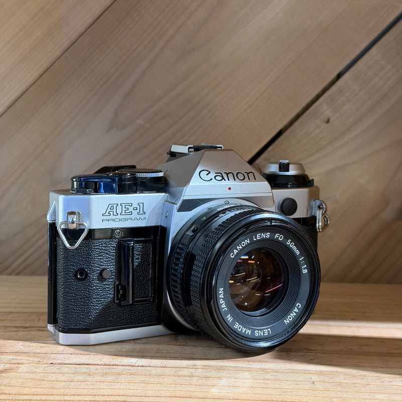 Canon AE-1 Program 35mm SLR Film Camera w/ Canon FD 50mm f/1.8 Lens (4346386)