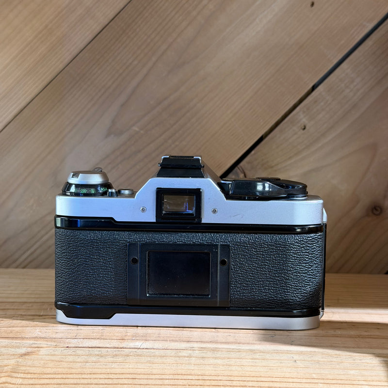 Canon AE-1 Program 35mm SLR Film Camera w/ Canon FD 50mm f/1.8 Lens (4346386)