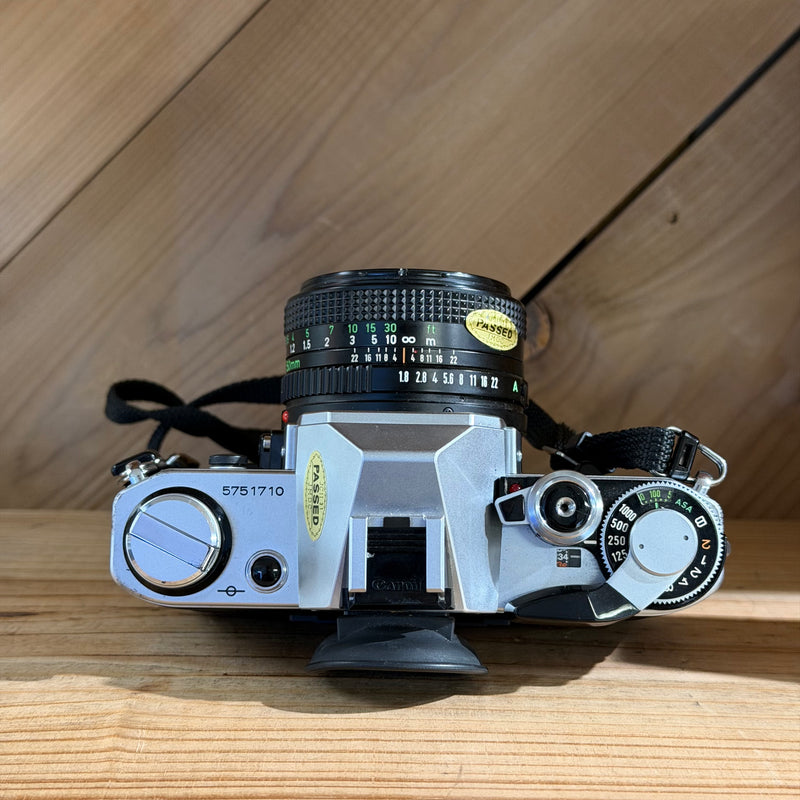 Canon AE-1 35mm SLR Film Camera w/ Canon FD 50mm f/1.8 Lens (5751710)