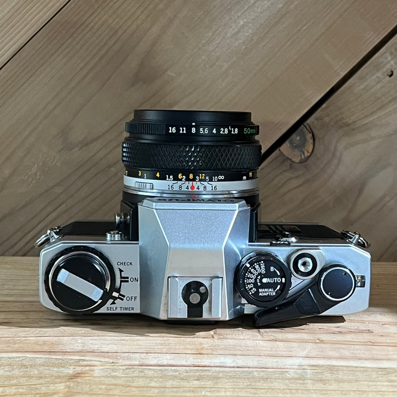 Olympus OM10 35mm SLR with Olympus OM 50mm f/1.8 Lens (696568)