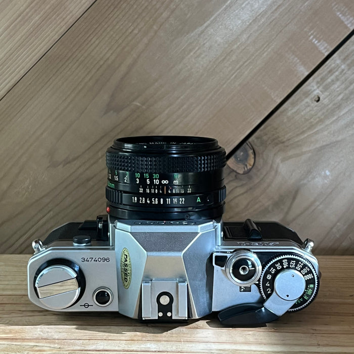 Canon AE-1 35mm SLR Camera w/ 50mm f/1.8 Lens (3474096)