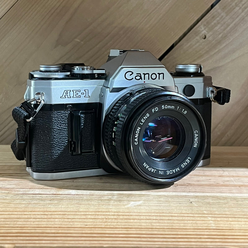 Canon AE-1 35mm SLR w/ 50mm f/1.8 Lens (5123815)