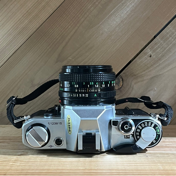Canon AE-1 35mm SLR w/ 50mm f/1.8 Lens (5123815)