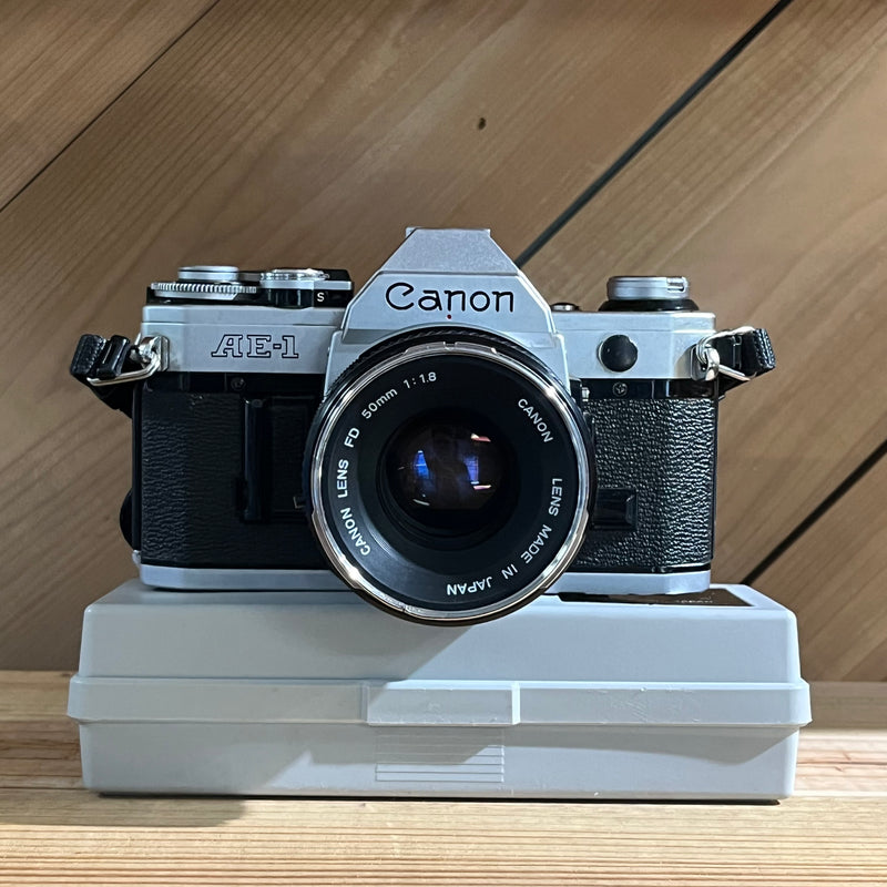 Canon AE-1 35mm SLR w/ Canon FD 50mm f/1.8 Lens + Canon Data Back A (2939092)