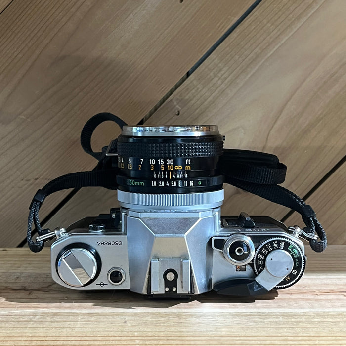 Canon AE-1 35mm SLR w/ Canon FD 50mm f/1.8 Lens + Canon Data Back A (2939092)