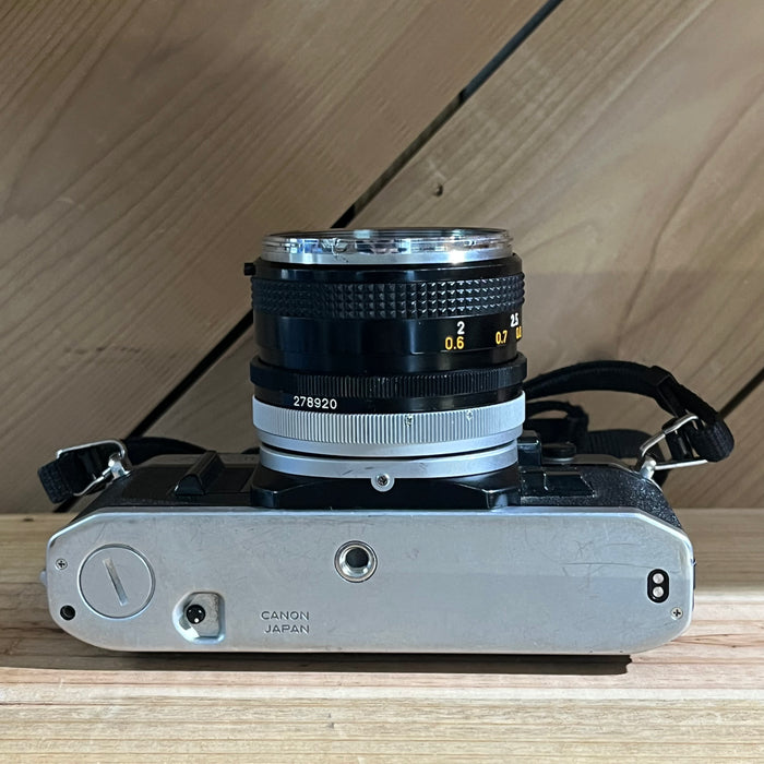 Canon AE-1 35mm SLR w/ Canon FD 50mm f/1.8 Lens + Canon Data Back A (2939092)
