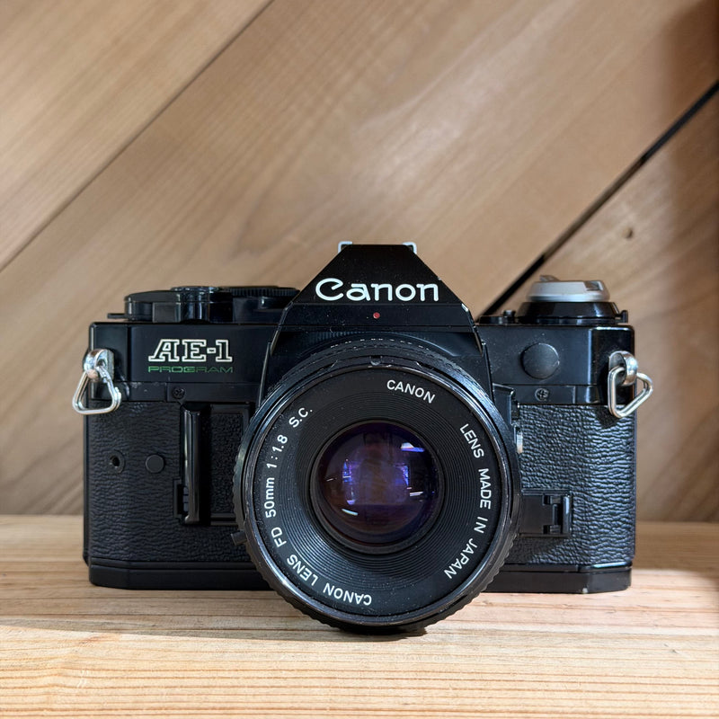 Canon AE-1 Program 35mm SLR Camera (Black Body) w/ Canon FD 50mm f/1.8 Lens (5001)