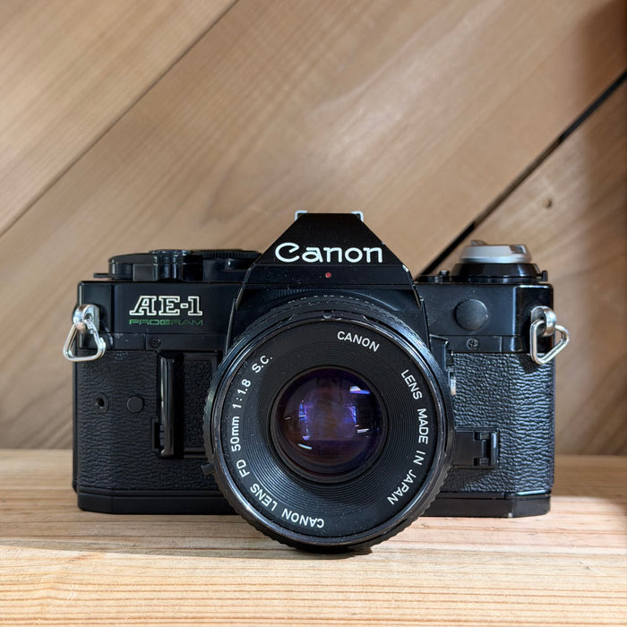 Canon AE-1 Program 35mm SLR Camera (Black Body) w/ Canon FD 50mm f/1.8 Lens (5001)