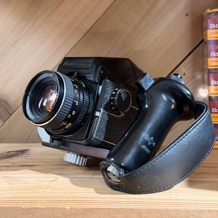 Mamiya 645 Medium Format SLR + Mamiya-Sekor C 80mm f/2.8 + Eye-Level Finder + Deluxe L-Grip Holder