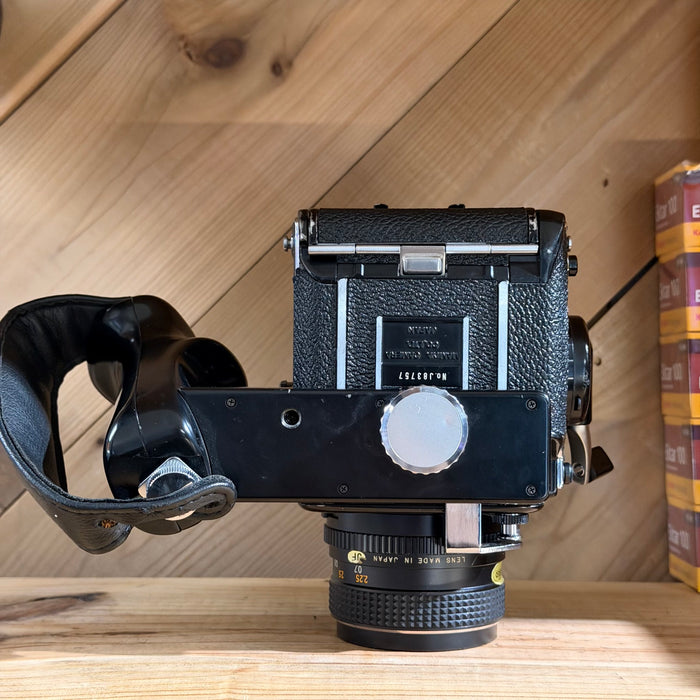 Mamiya 645 Medium Format SLR + Mamiya-Sekor C 80mm f/2.8 + Eye-Level Finder + Deluxe L-Grip Holder