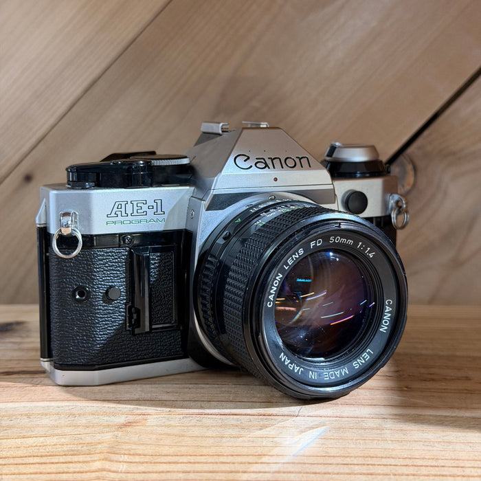 Canon AE-1 Program 35mm SLR Film Camera w/ Canon FD 50mm f/1.4 Lens (4698597)
