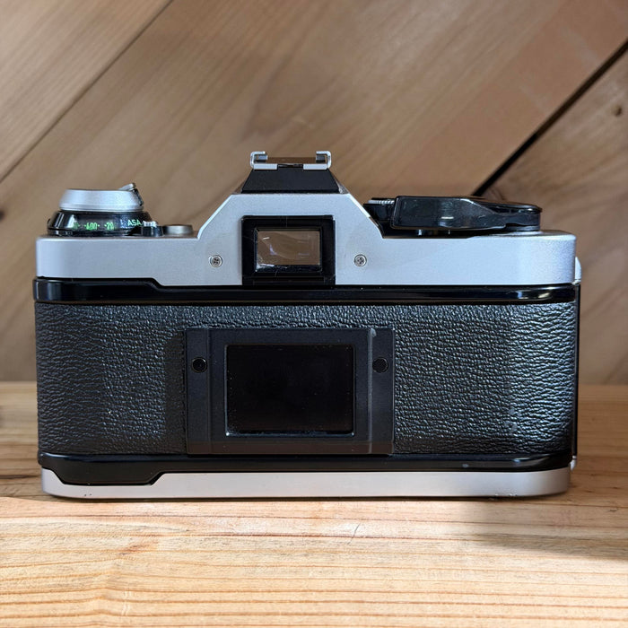 Canon AE-1 Program 35mm SLR Film Camera w/ Canon FD 50mm f/1.4 Lens (4698597)