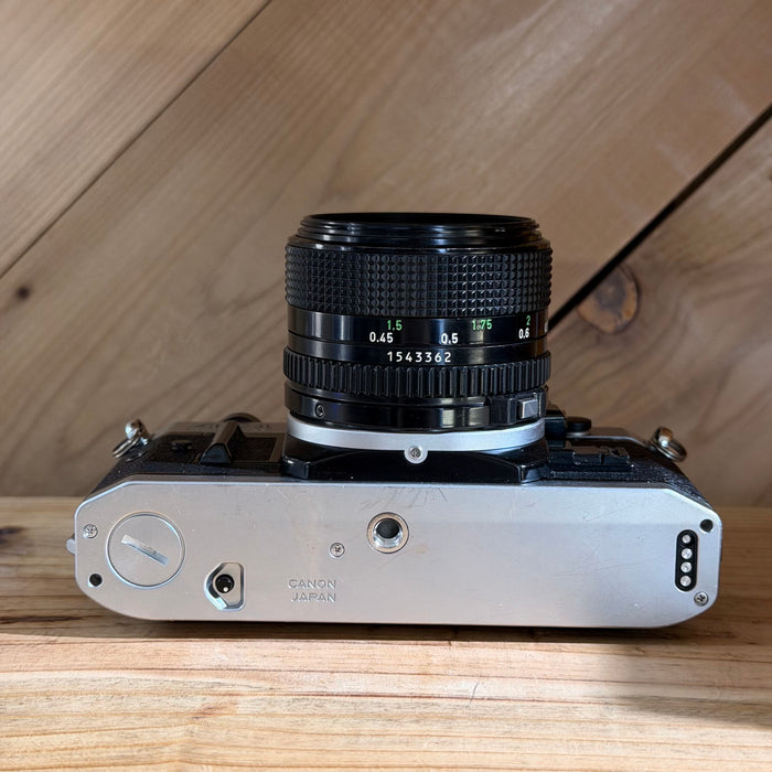 Canon AE-1 Program 35mm SLR Film Camera w/ Canon FD 50mm f/1.4 Lens (4698597)