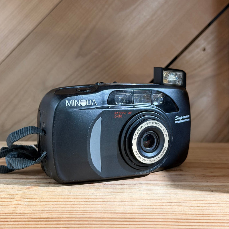 Minolta Supreme Freedom Zoom 35mm Point & Shoot Film Camera (Black) (00608174)