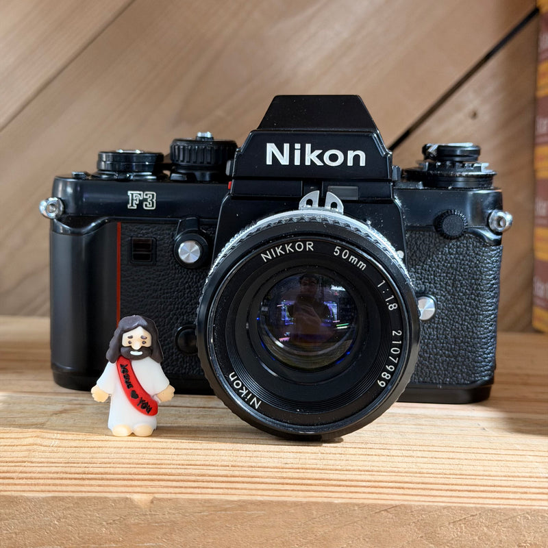 Nikon F3 35mm Professional SLR Film Camera w/ Nikon 50mm f/1.8 Lens (Black) (1464689)