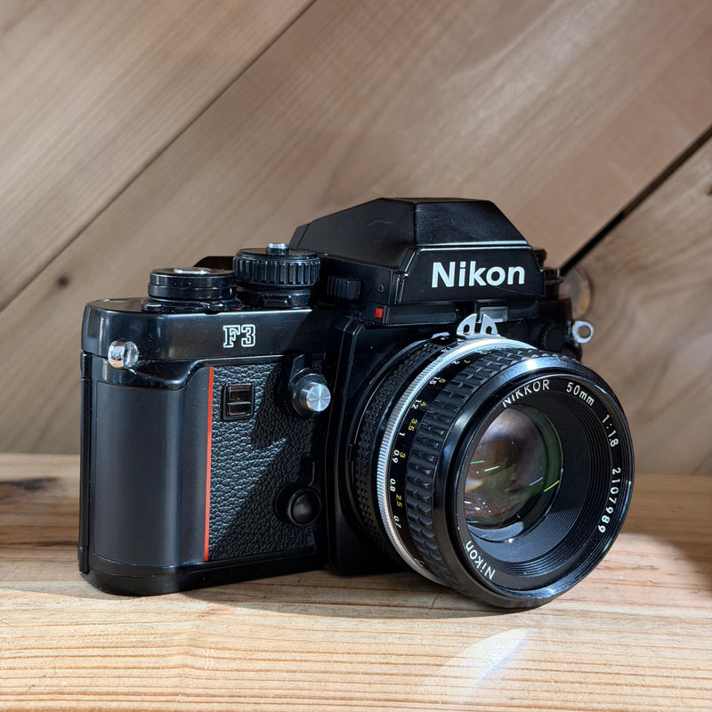 Nikon F3 35mm Professional SLR Film Camera w/ Nikon 50mm f/1.8 Lens (Black) (1464689)