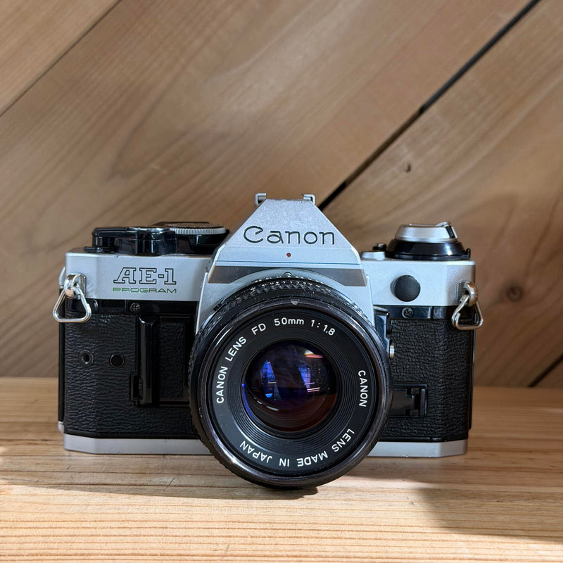 Canon AE-1 Program 35mm SLR Film Camera w/ Canon FD 50mm f/1.8 Lens (1974157)