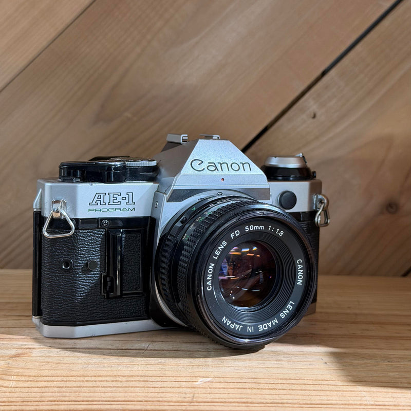 Canon AE-1 Program 35mm SLR Film Camera w/ Canon FD 50mm f/1.8 Lens (1974157)