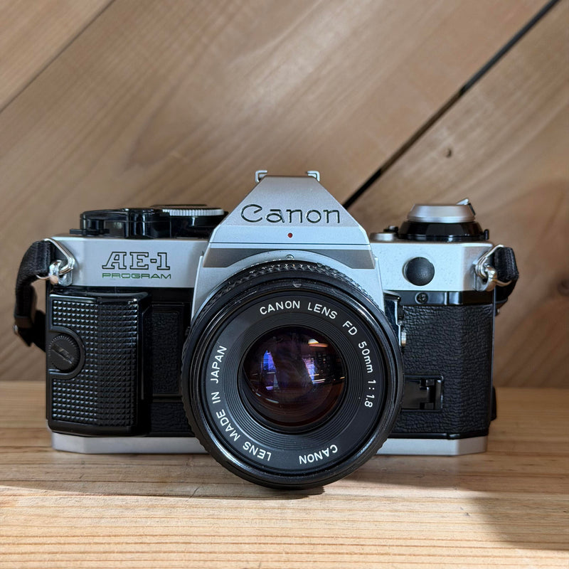 Canon AE-1 Program 35mm SLR Film Camera w/ Canon FD 50mm f/1.8 Lens (3685477)