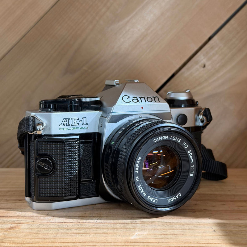 Canon AE-1 Program 35mm SLR Film Camera w/ Canon FD 50mm f/1.8 Lens (3685477)