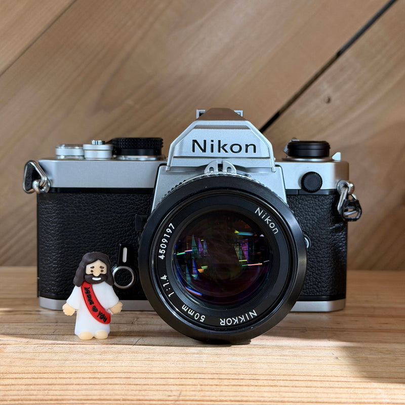 Nikon FM 35mm SLR Film Camera w/ Nikkor 50mm f/1.4 Lens (3090301) (Silver Body)