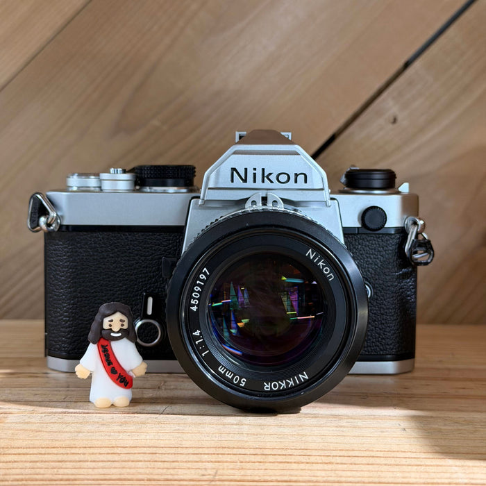 Nikon FM 35mm SLR Film Camera w/ Nikkor 50mm f/1.4 Lens (3090301) (Silver Body)