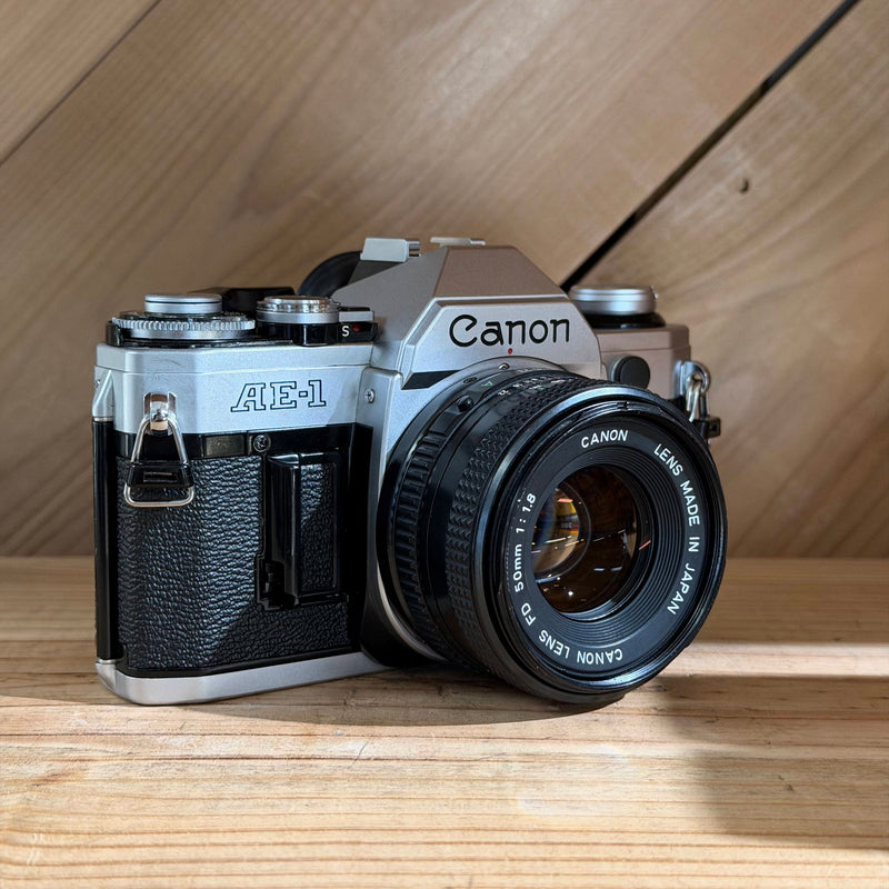 Canon AE-1 35mm SLR Film Camera w/ Canon FD 50mm f/1.8 Lens (4820993) (Silver Body)