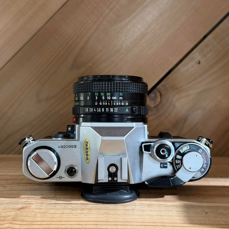 Canon AE-1 35mm SLR Film Camera w/ Canon FD 50mm f/1.8 Lens (4820993) (Silver Body)