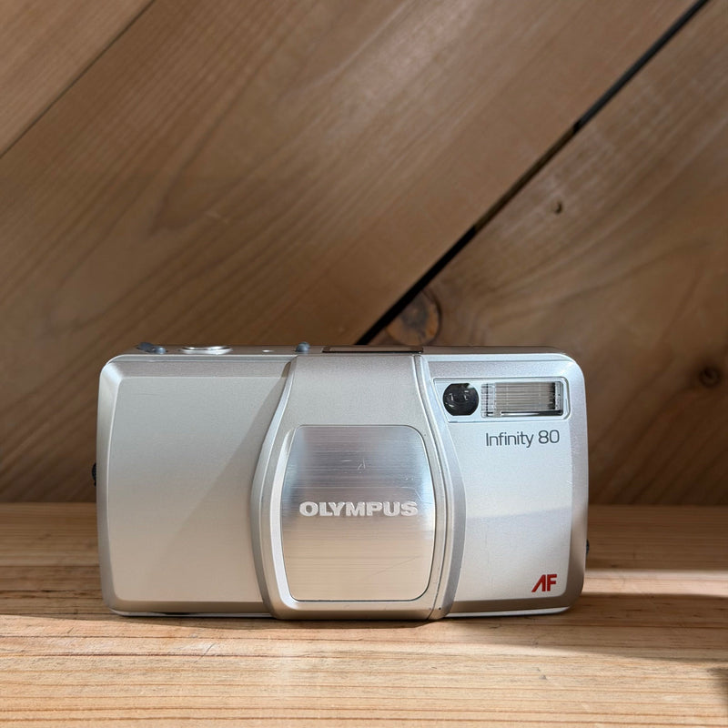 Olympus Infinity 80 Quartz Date AF Zoom 35mm Point & Shoot Film Camera (1426106) (Silver Body)