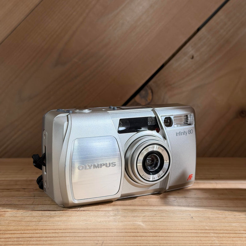 Olympus Infinity 80 Quartz Date AF Zoom 35mm Point & Shoot Film Camera (1426106) (Silver Body)