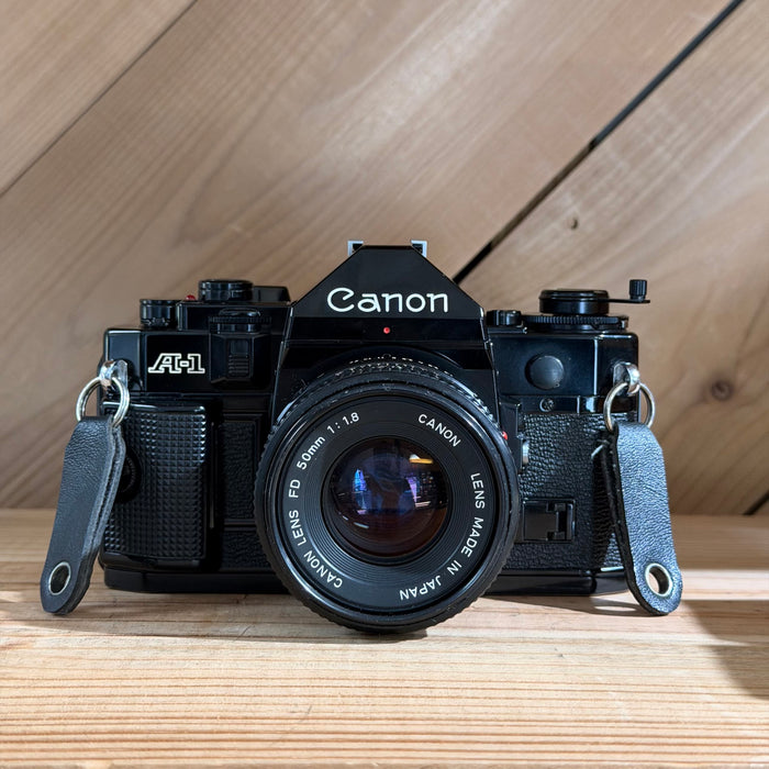 Canon A-1 35mm SLR Film Camera w/ Canon FD 50mm f/1.8 Lens (552002) (Black Body)