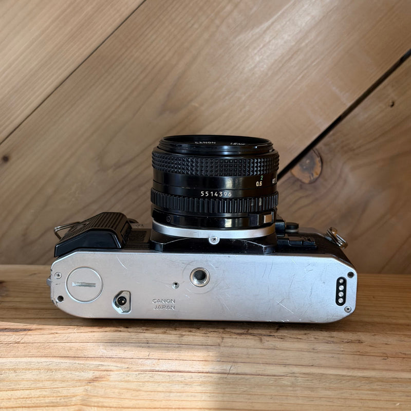 Canon AE-1 Program 35mm SLR Film Camera w/ Canon FD 50mm f/1.8 Lens (4504026) (Silver Body)