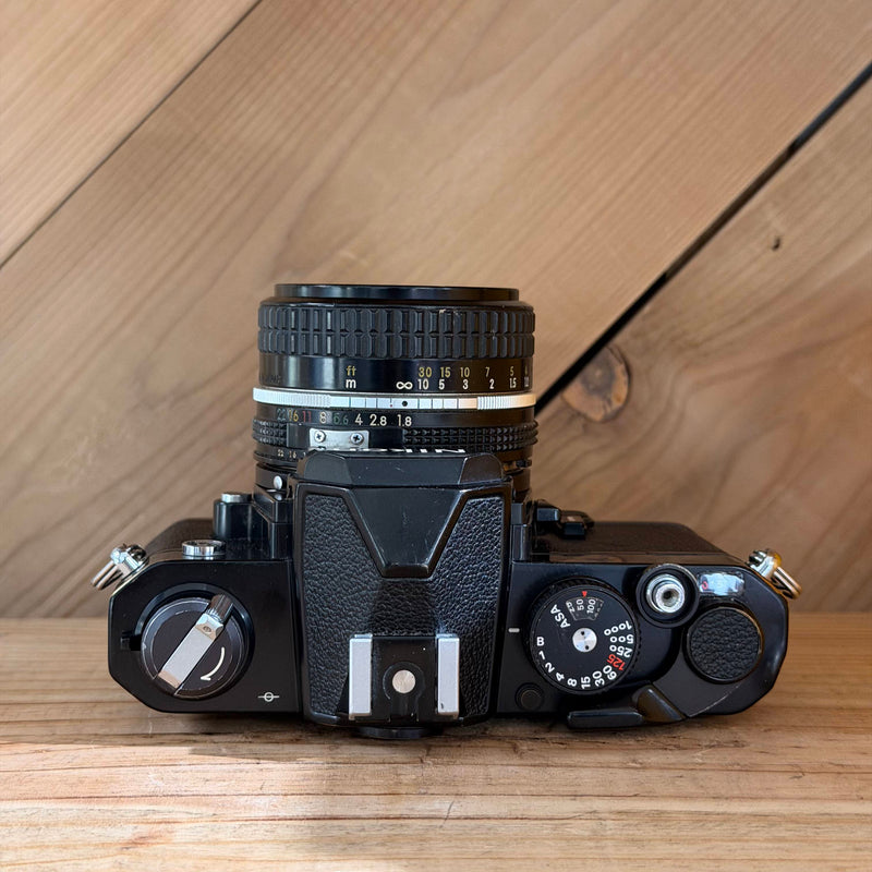 Nikon FM 35mm SLR Film Camera w/ Nikkor 50mm f/1.8 Lens (3144284)