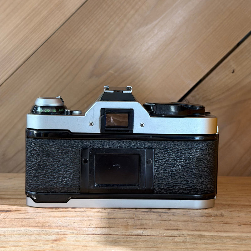 Canon AE-1 Program 35mm SLR Film Camera w/ Canon FD 50mm f/1.8 Lens (1776571)