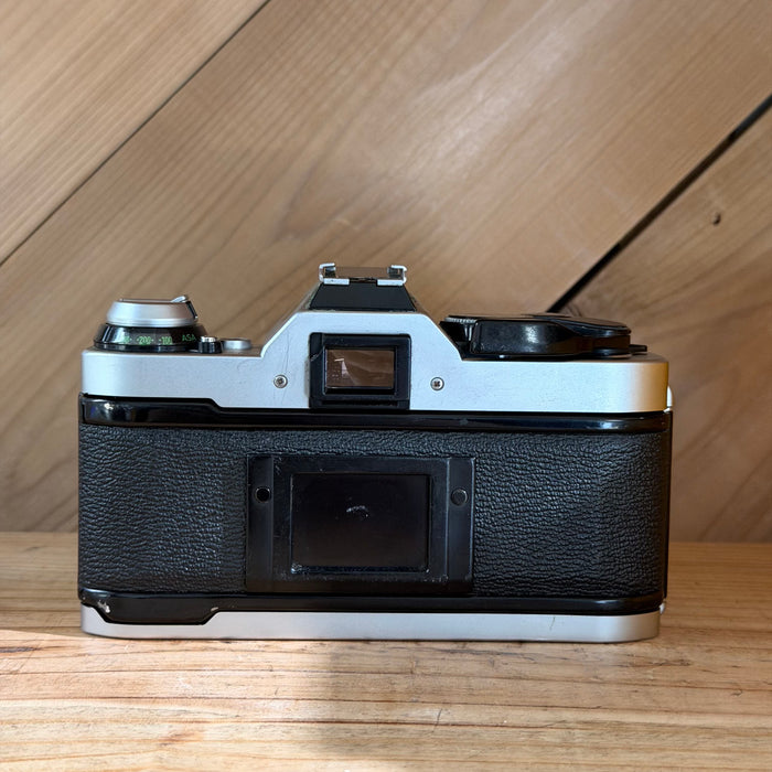 Canon AE-1 Program 35mm SLR Film Camera w/ Canon FD 50mm f/1.8 Lens (1776571)