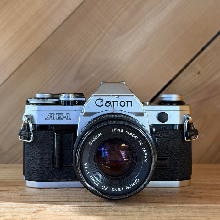 Canon AE-1 35mm SLR Film Camera w/ Canon FD 50mm f/1.8 Lens (160071) (Silver Body)