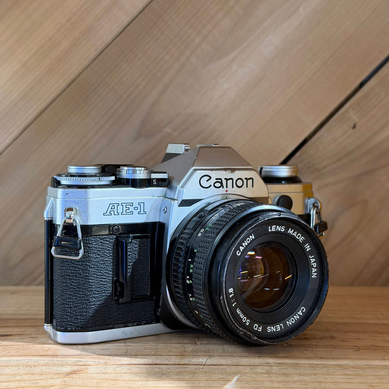 Canon AE-1 35mm SLR Film Camera w/ Canon FD 50mm f/1.8 Lens (160071) (Silver Body)