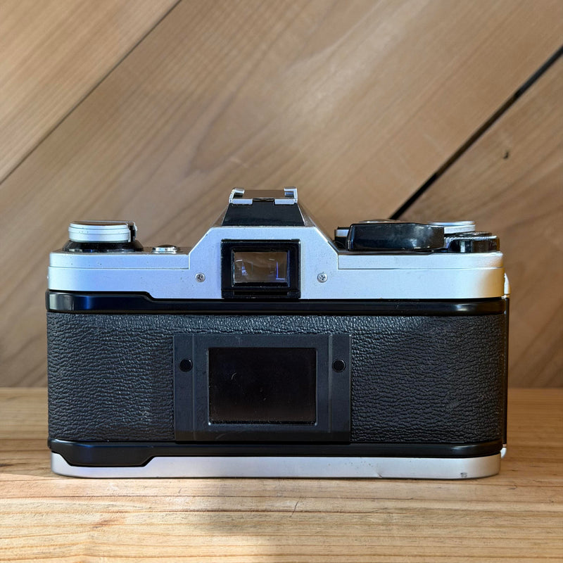 Canon AE-1 35mm SLR Film Camera w/ Canon FD 50mm f/1.8 Lens (160071) (Silver Body)
