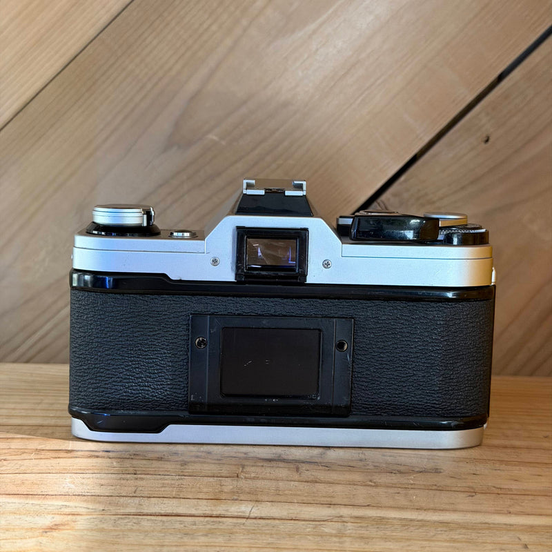 Canon AE-1 35mm SLR Film Camera w/ Canon FD 50mm f/1.8 Lens (591025) (Silver Body)