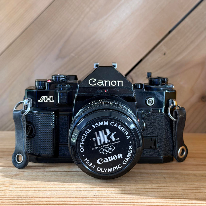 Canon A-1 35mm SLR Film Camera w/ Canon FD 50mm f/1.8 Lens (1305502) (Black Body)