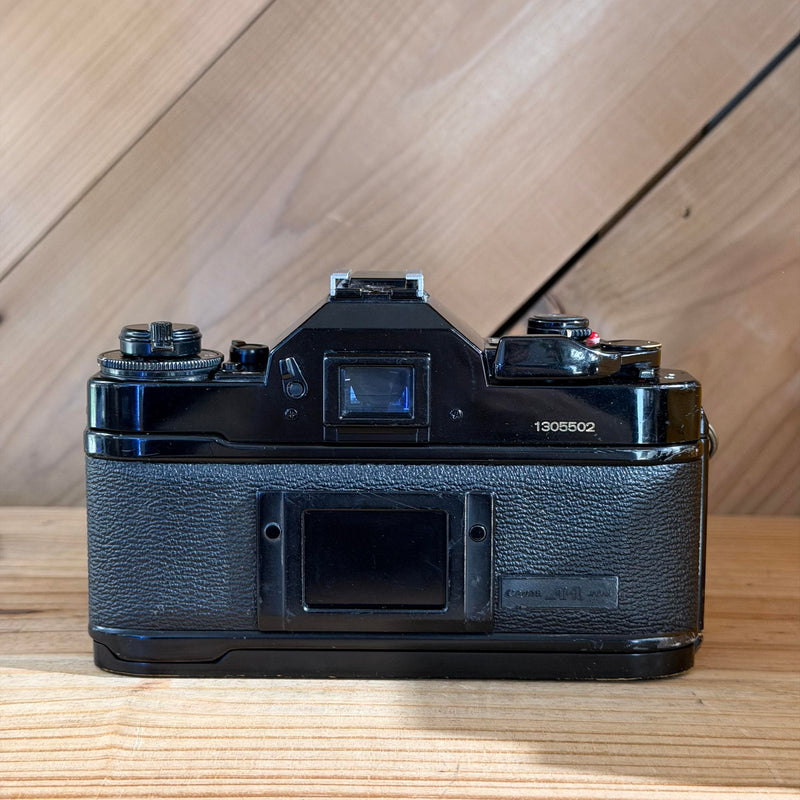 Canon A-1 35mm SLR Film Camera w/ Canon FD 50mm f/1.8 Lens (1305502) (Black Body)
