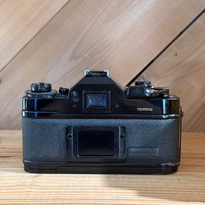 Canon A-1 35mm SLR Film Camera w/ Canon FD 50mm f/1.8 Lens (1305502) (Black Body)
