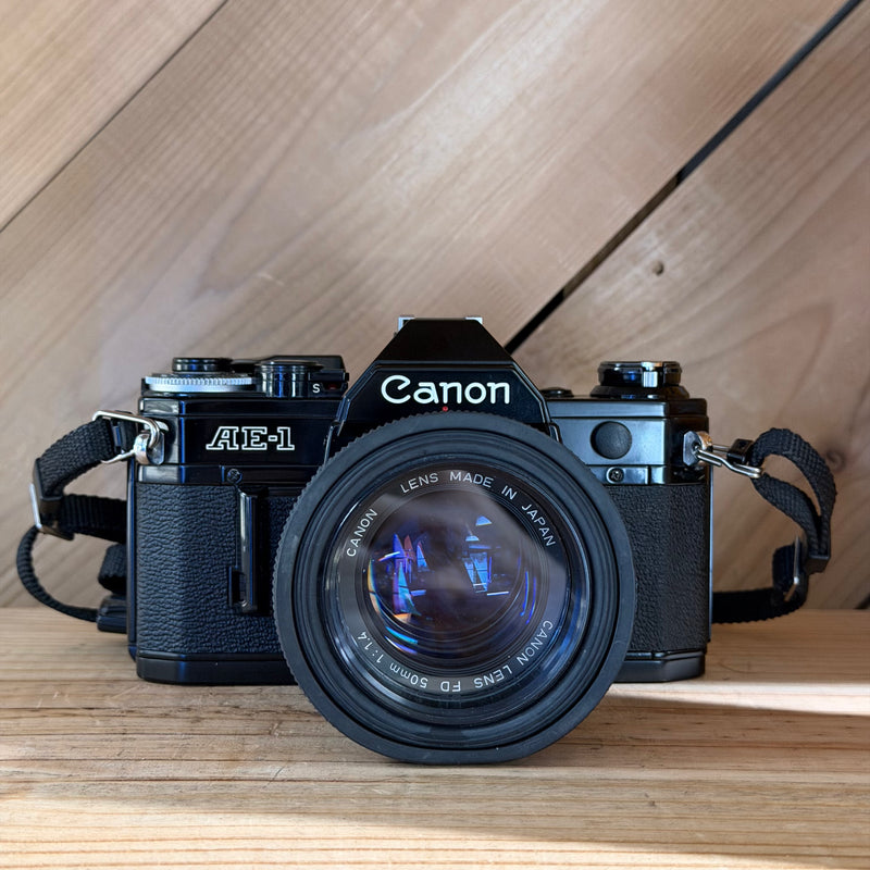 Canon AE-1 35mm SLR Film Camera w/ Canon FD 50mm f/1.4 Lens (4505278) (Black Body)