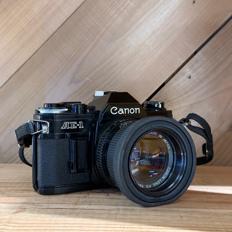 Canon AE-1 35mm SLR Film Camera w/ Canon FD 50mm f/1.4 Lens (4505278) (Black Body)