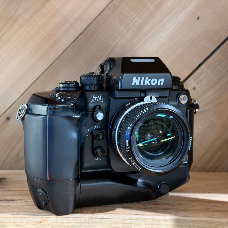 Nikon F4 35mm Professional SLR Film Camera w/ Nikkor 28mm f/3.5 Lens (US 2461747)