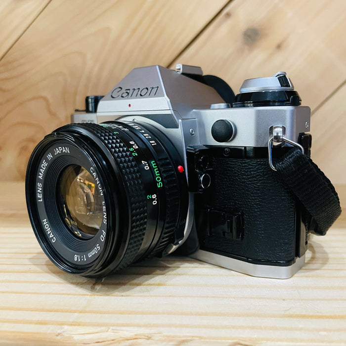Canon AE-1 Program with 50mm f/1.8 lens S#3853147